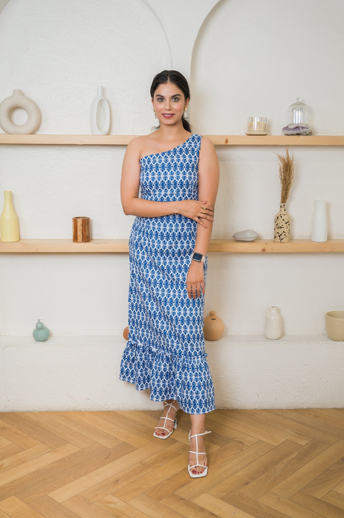 One-shoulder linen maxi with flared hemline that can be made to your measurement or customized to match your unique style.