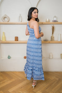 One-shoulder linen maxi with flared hemline that can be made to your measurement or customized to match your unique style.